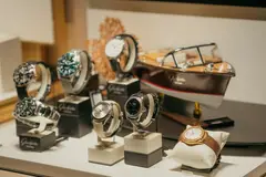 A collection of luxury watches elegantly displayed in a retail setting
